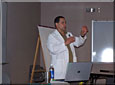 Dr. Komor discussing an OCD concept during a seminar.